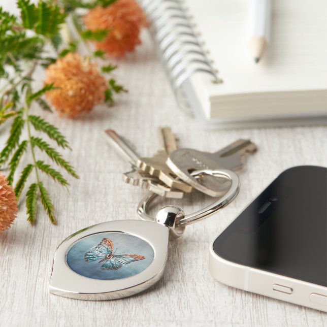 Porte-clés Papillon de texture gris bleu (Côté )