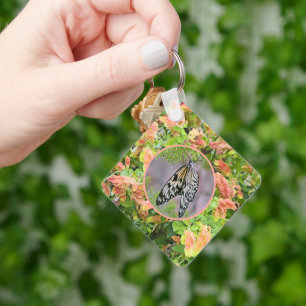 Porte-clés Papillon parmi les fleurs