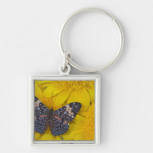 Porte-clés Papillon sur une Fleur Jaune