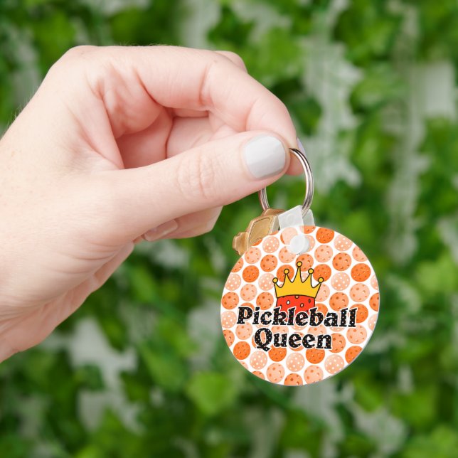 Porte-clés Pickleball Queen - Orange Ball portant Couronne or (main)