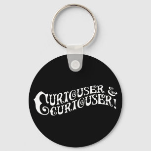 Porte-clés Plus curieux et plus curieux