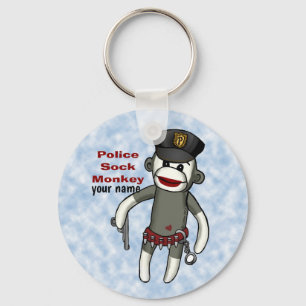 Porte-clés Porte - clé de la police du singe de Sock