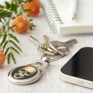 Porte-clés Porte - clé de métal du crâne d'or