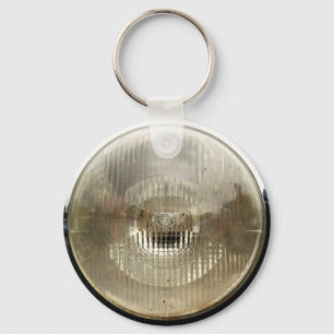 Porte-clés Projecteur de voiture classique avec objectif en v