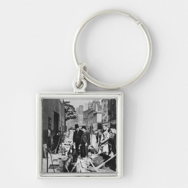 Porte-clés Réparation d'un tuyau (Devant)