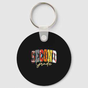 Porte-clés Retour au football de baseball de basketball scola