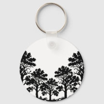 Porte-clés rond silhouette d'arbres noirs