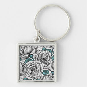 Porte-clés Roses blanches avec feuilles bleus