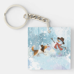 Porte-clés Sheldon le Sheltie et le Bonhomme de Neige