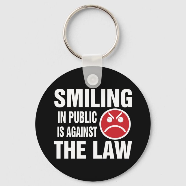 Porte-clés Sourire en public est contre la loi (Recto)
