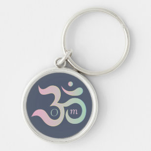 Porte-clés Symbole Om en sanskrit rose pastel vert foncé bleu