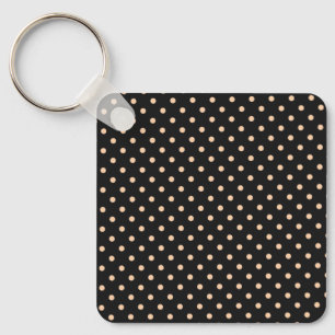 Porte-clés Taches pêche abricot sur fond noir