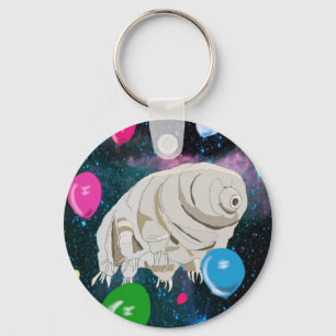 Porte-clés Tardigrade dans l'espace avec des ballons colorés