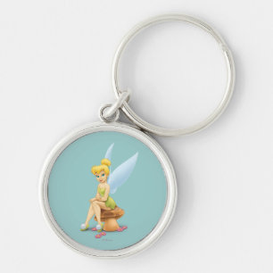Porte-clés Tinker Bell assis sur le champignon