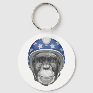 Porte-clés Un cavalier de moto de chimpanzé