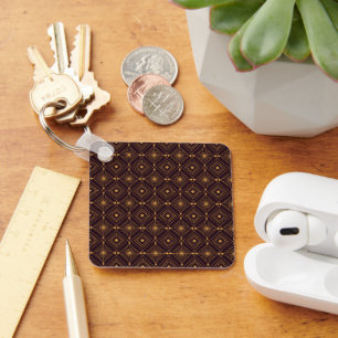 Porte-clés Un motif géométrique continu avec de l'art en or