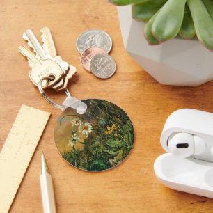 Porte-clés Un plancher forestier avec marguerites, primeurs, 