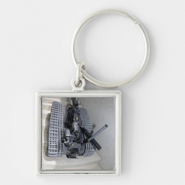 Porte-clés Un robot Talon 3B escalade un vol de stai (Devant)