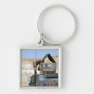 Porte-clés Un soldiier instruit un soldat irakien d'armée