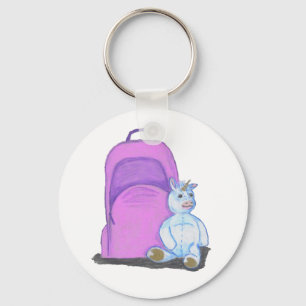 Porte-clés Unicorne farcie assis par un sac à dos de l'école 