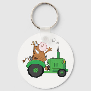 Porte-clés Vache Conduisant Un Tracteur