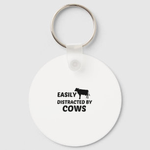 PORTE-CLÉS VACHE FACILEMENT DISTRACTÉE