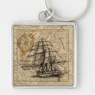 Porte-clés Vieux navire à voiles et vieille carte de l'Europe
