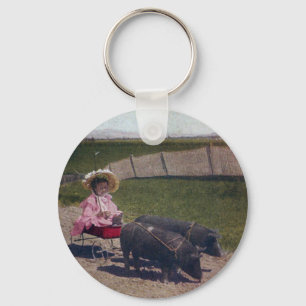 Porte-clés Vintage fille et ses cochons pour animaux de compa