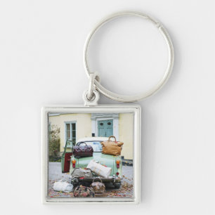 Porte-clés Voiture vintage avec un bon nombre de bagage
