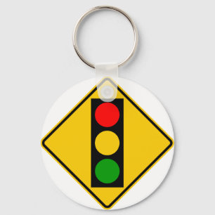 Porte-clés Voyage léger avant le signal routier