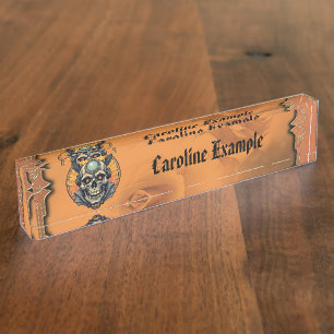 Porte-nom Le crâne ailé.