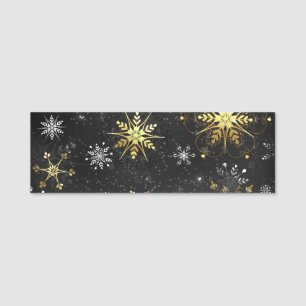Porte-nom Les flocons dorés de Noël sur l'Arrière - plan noi