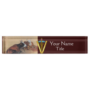 PORTE-NOM SYMBOLE MENTEUR DE VÉTÉRINAIRE DE CADUCÉE D'OR