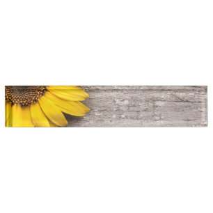 Porte-nom Tournesol sur une table en bois