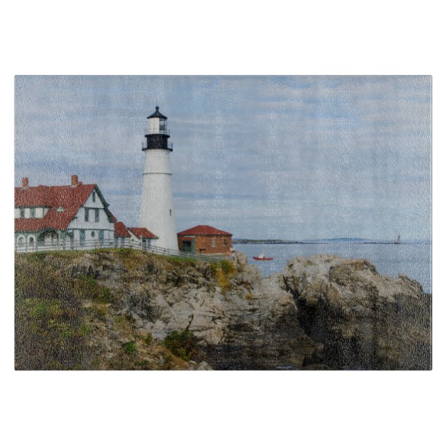 Portland Headlight lighthouse on rocky shore Cutting Board (Front)