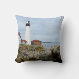 Portland Headlight lighthouse on rocky shore Throw Pillow