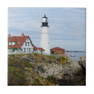 Portland Headlight lighthouse on rocky shore Tile