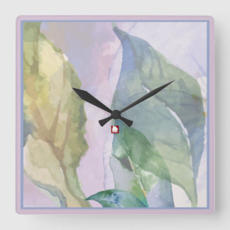 Portrait d'une feuille bleue d'or par horloge mura