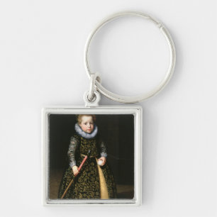 Portrait of a four-year old boy with club and keychain