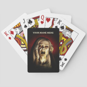 Portrait of a woman screaming playing cards