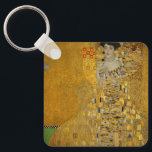 Portrait of Adele Bloch-Bauer I by Gustav Klimt Keychain<br><div class="desc">Portrait of Adele Bloch-Bauer I (1903-1907) by Gustav Klimt is a vintage Victorian Era Symbolism fine art portrait painting. Portrait of Adele Bloch-Bauer I is also known as The Lady in Gold or the Woman in Gold. The portrait shows Adele Bloch-Bauer sitting on a golden chair in front of a...</div>