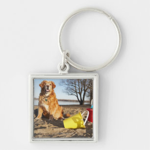 Portrait of dog at beach with sand toys, Ottawa, Keychain
