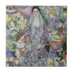 Portrait of Friederike Maria Beer by Gustav Klimt Tile<br><div class="desc">Portrait of Friederike Maria Beer (1916) by Gustav Klimt is a vintage Victorian Era Symbolism fine art portrait painting. Friederike-Maria requested that Klimt paint her in a Viennese Workshop dress which she wore exclusively. Klimt decided that she should wear her fur coat inside out so that the decorative lining (also...</div>