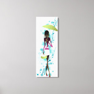 Portrait of young woman holding purse and umbrella canvas print