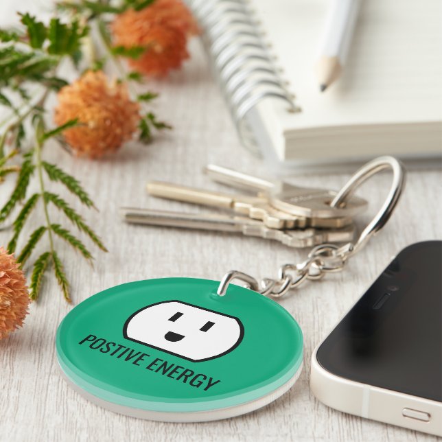 Positive Energy funny green wall plug socket Keychain (Front Right)