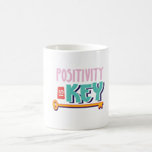 positivity is the key design coffee mug