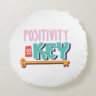 positivity is the key design round pillow
