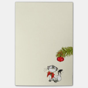 Post-it® Chat Kitty En Jeu Dans Une Bow De Noël Rouge