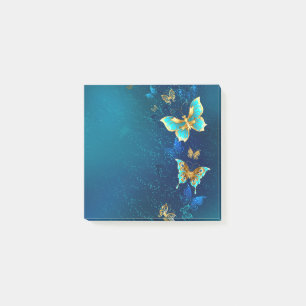 Post-it® Papillons d'or sur un Arrière - plan bleu