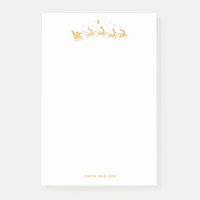 Père Noël d'or volant en traîneau avec rennes